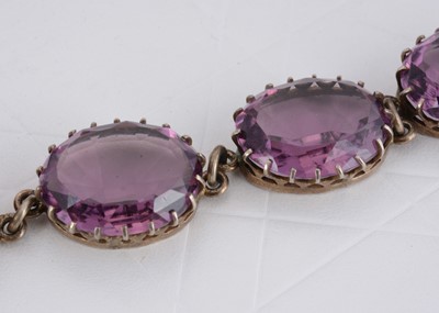 Lot 79 - A white metal and mauve paste necklace and bracelet set