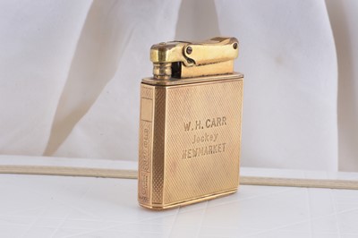 Lot 80 - A 14ct gold Calibri presentation lighter with clock movement