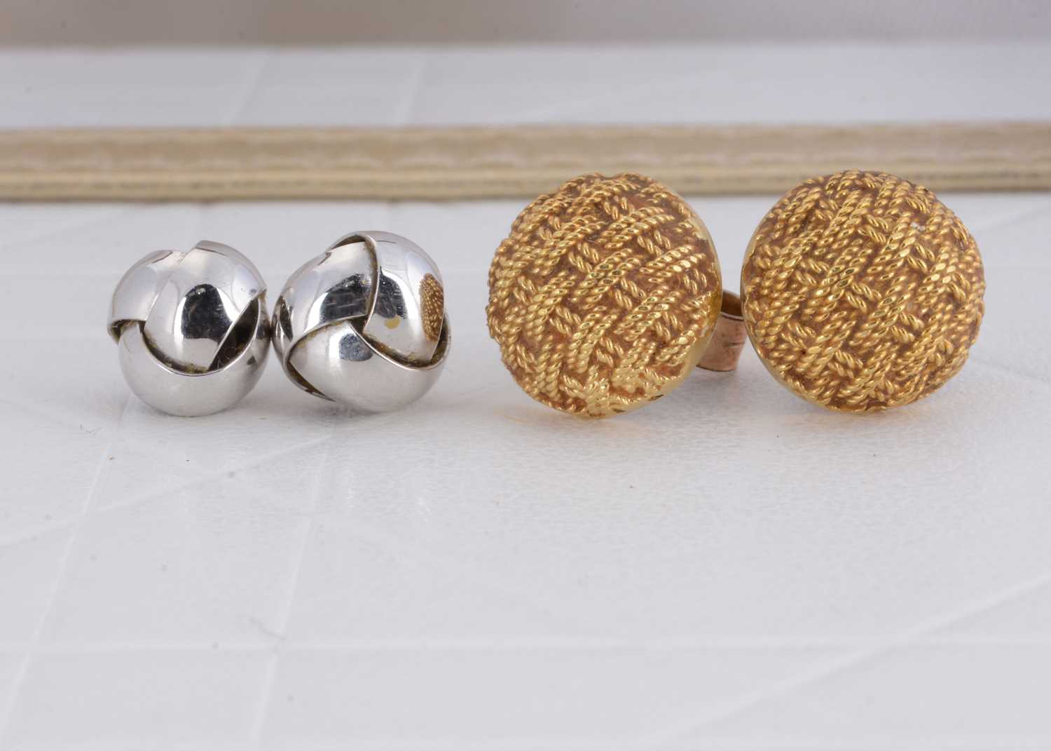 Lot 91 - A pair of 18ct gold domed basket ear studs