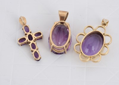 Lot 149 - Three gold amethyst pendants