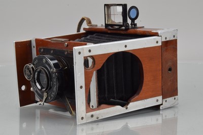 Lot 24 - A Shrew & Co Mahogany & Aluminium Xit Quarter Plate Strut Camera