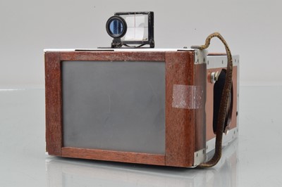 Lot 24 - A Shrew & Co Mahogany & Aluminium Xit Quarter Plate Strut Camera