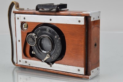 Lot 24 - A Shrew & Co Mahogany & Aluminium Xit Quarter Plate Strut Camera
