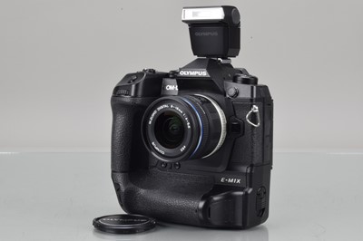 Lot 34 - An Olympus OM-D E-M1X Digital Camera