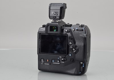 Lot 34 - An Olympus OM-D E-M1X Digital Camera
