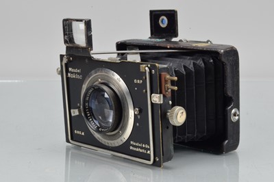 Lot 59 - A Plaubel Makina II 4.5 x 6cm Folding Strut Camera