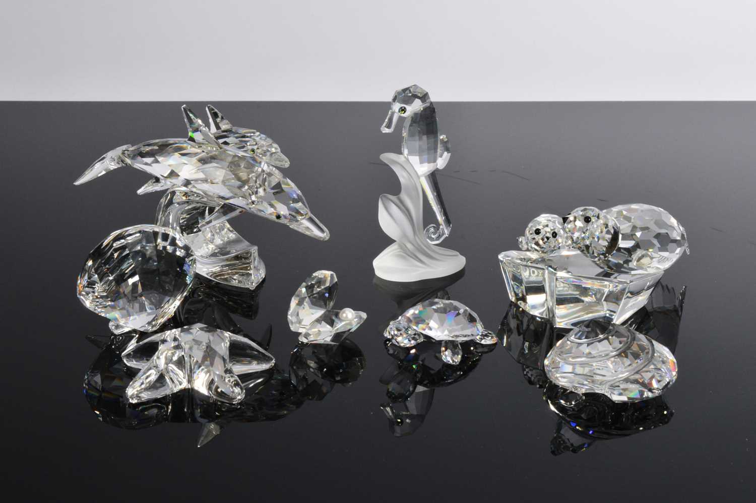 Lot 7 - A collection of eight Swarovski sea figures
