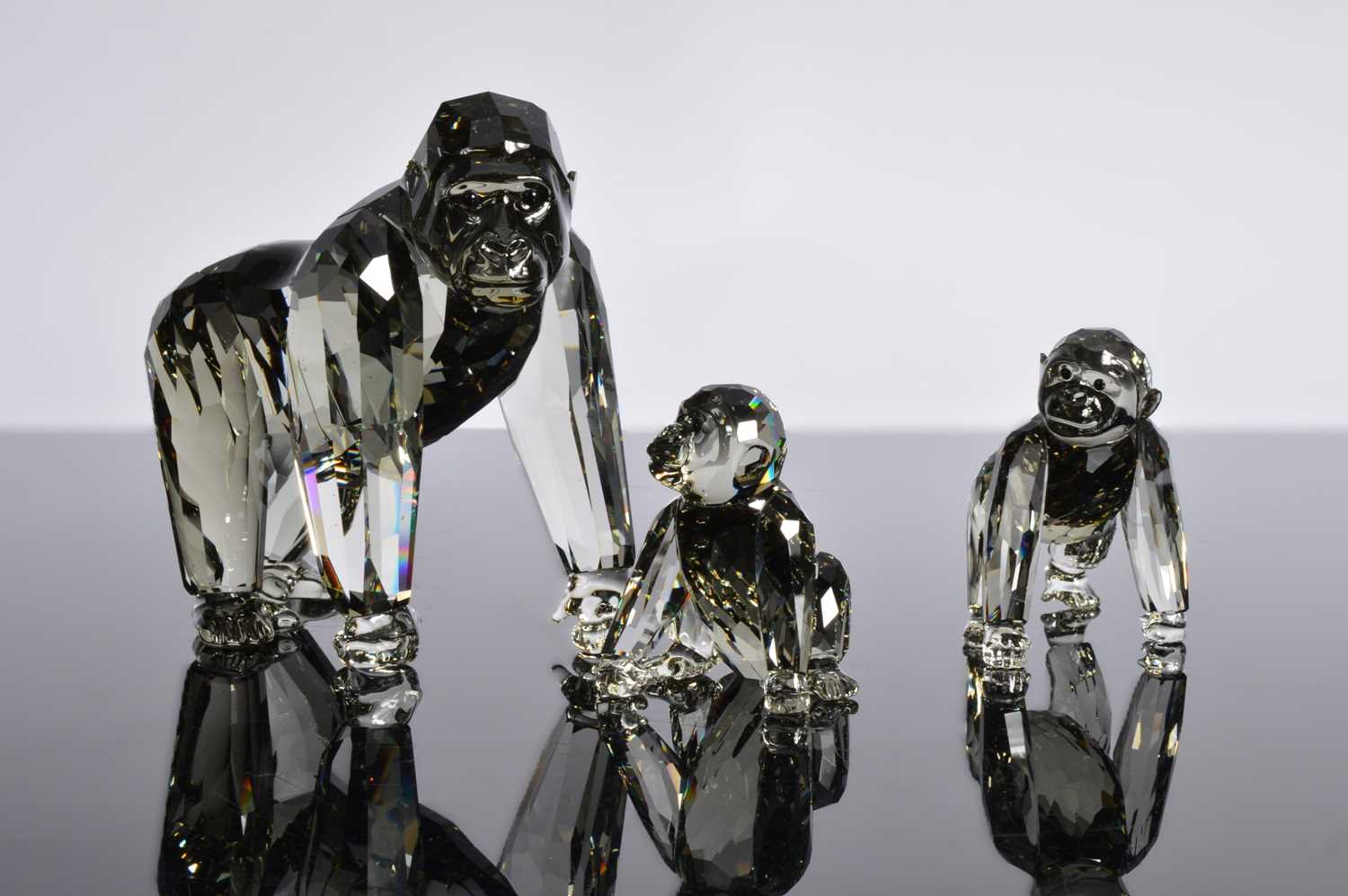 Lot 66 - Three Swarovski Gorillas Mother and Baby