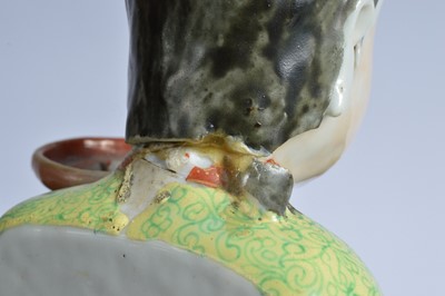 Lot 78 - Two damaged mid 20th century Chinese porcelain figural candle holders