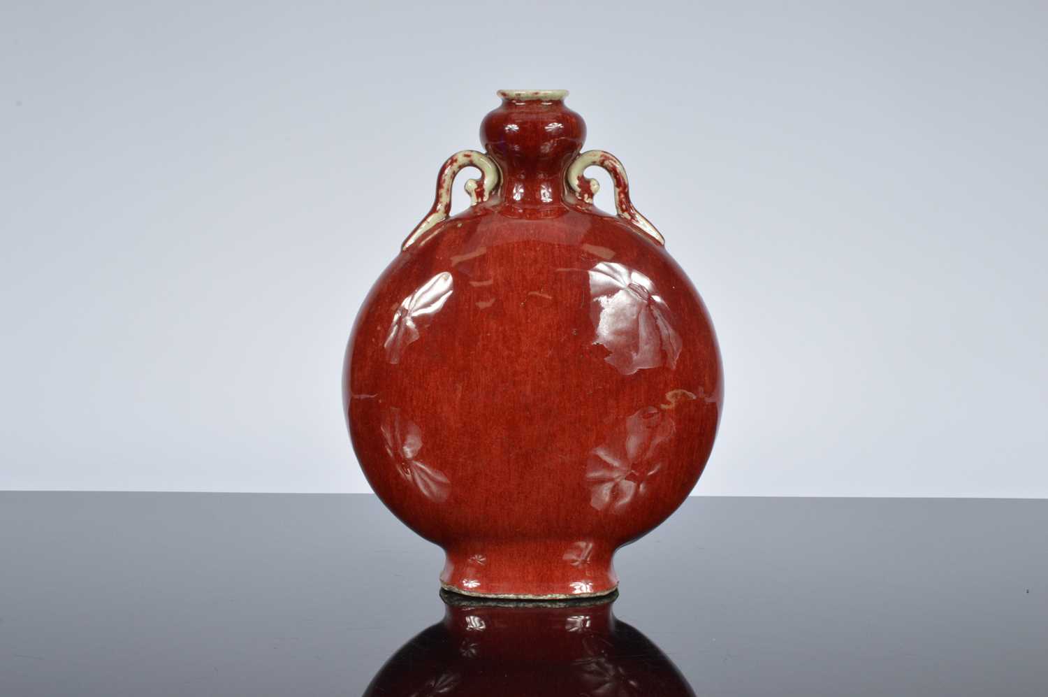 Lot 94 - A fine antique Chinese porcelain sang du beouf moon flask vase