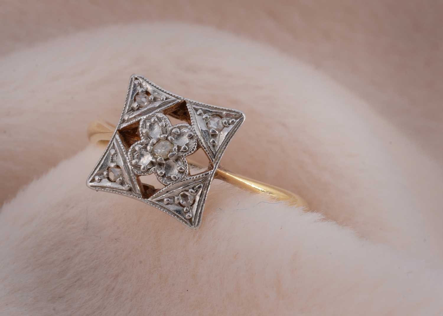 Lot 26 - An art deco platinum and 18ct gold square shaped tablet ring