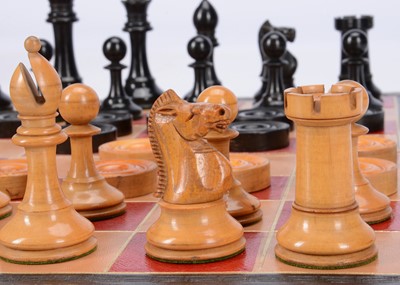 Lot 136 - An early 20th century Staunton chess and draught set