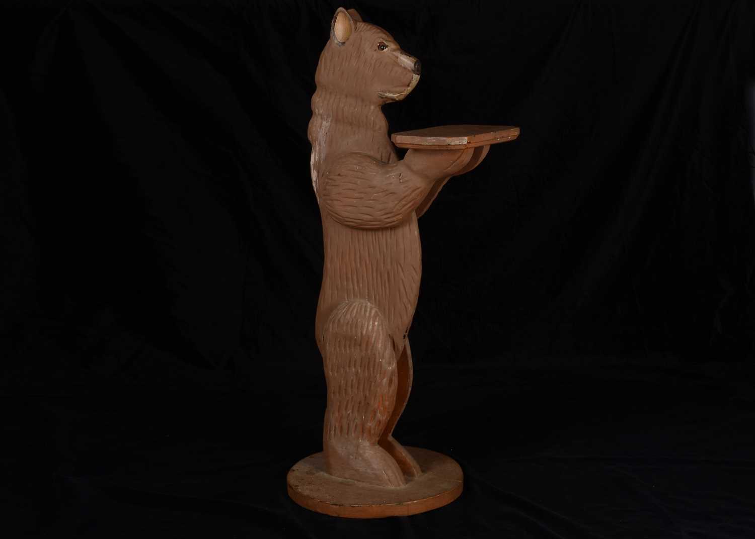 Lot 101 - A carved wooden bear dumb waiter