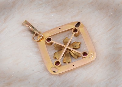 Lot 11 - A 15ct gold ruby and seed pearl drop pendant