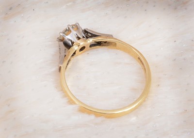 Lot 19 - A diamond 18ct gold solitaire ring