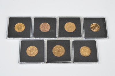 Lot 62 - A set of seven gold coins