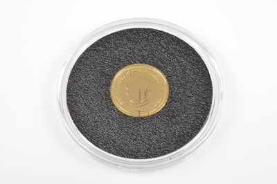 Lot 94 - A modern 9ct gold coin