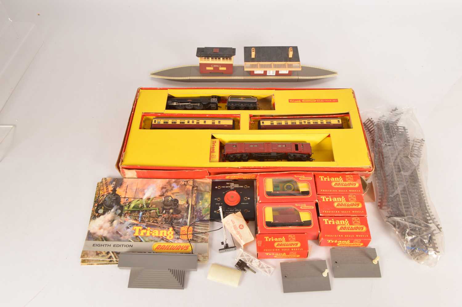 Lot 48 - Tri-ang Passenger set with extra wagons buildings and catalogues 00 gauge  (qty in 1 box)