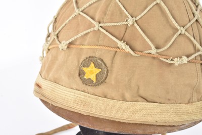 Lot 348 - A WWII Imperial Japanese Army Type 90 Combat Helmet