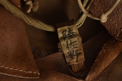 Lot 348 - A WWII Imperial Japanese Army Type 90 Combat Helmet