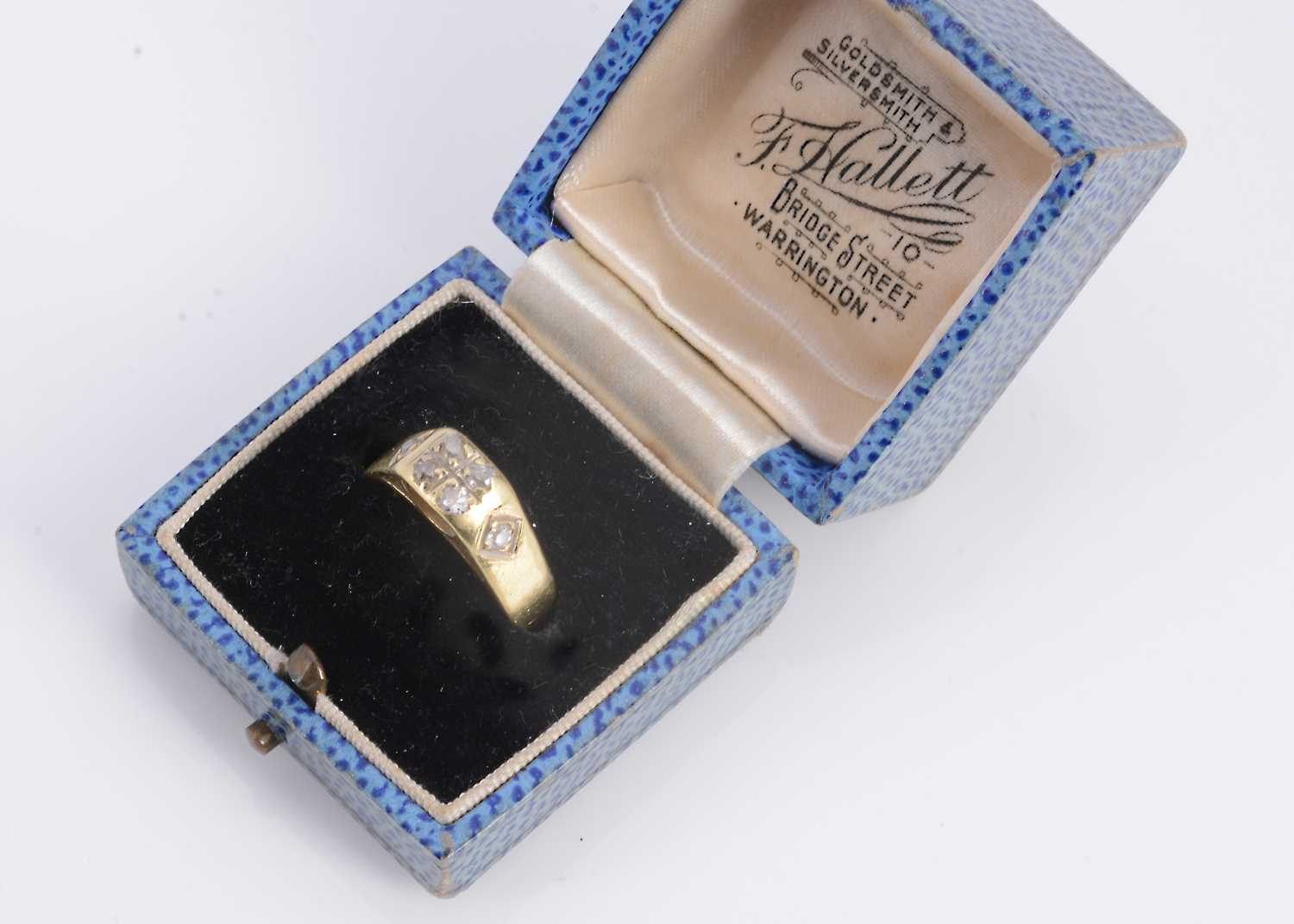 Lot 12 - An 18ct yellow gold diamond set dress ring