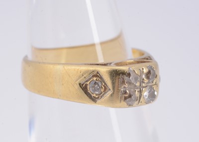 Lot 12 - An 18ct yellow gold diamond set dress ring