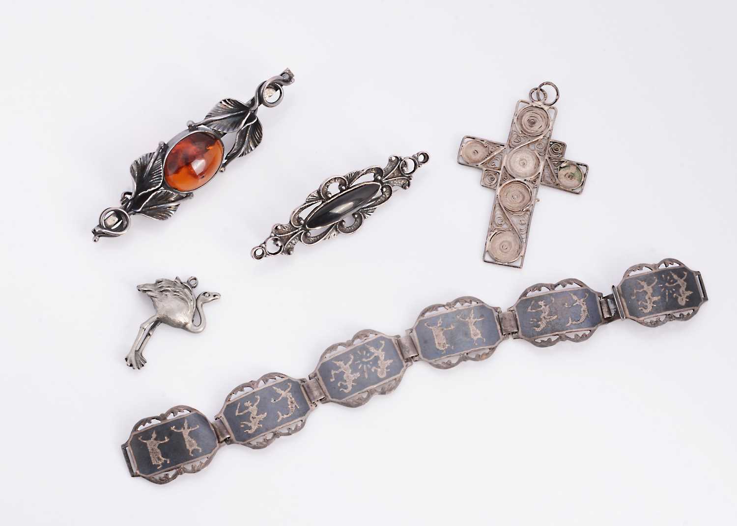 Lot 13 - A collection of white metal items