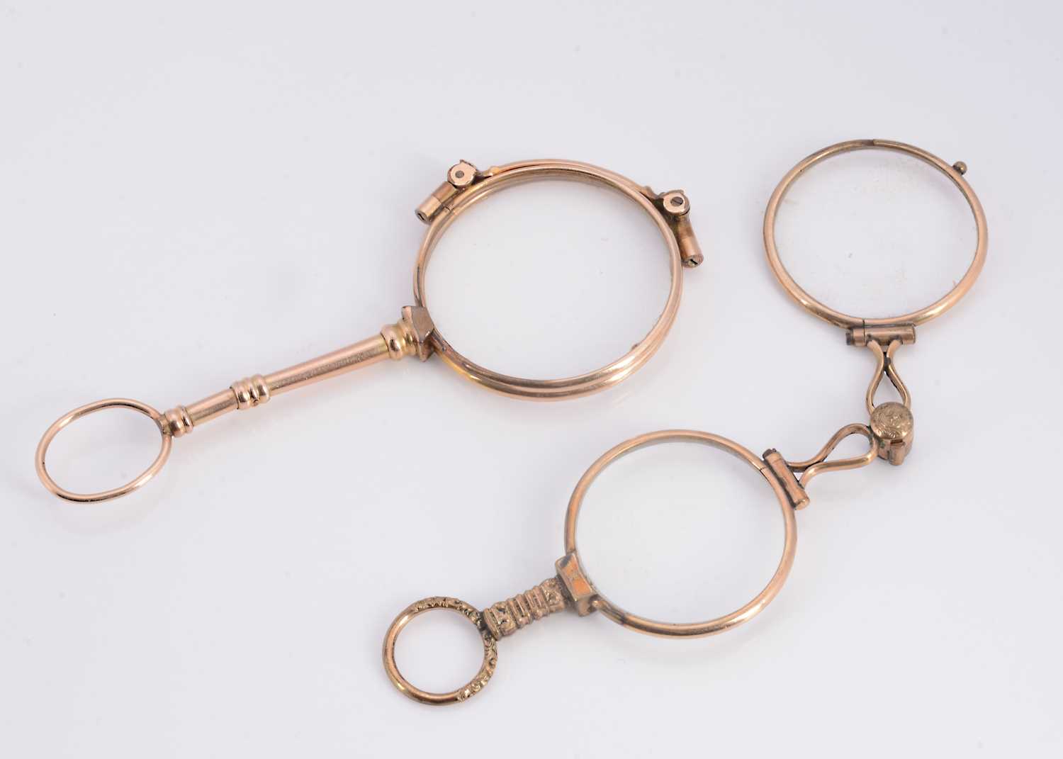 Lot 20 - Two sets of yellow metal lorgnettes