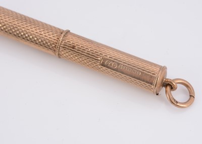 Lot 21 - A 9ct gold tooth pick
