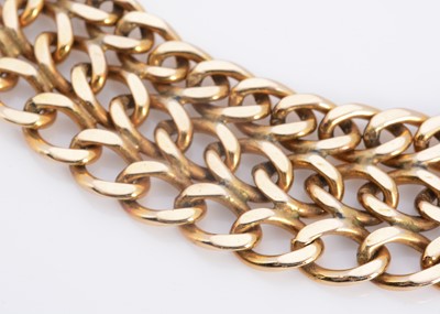 Lot 41 - A 18ct gold three strand curb bracelet