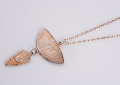 Lot 55 - An silver enamelled Pat Cheney pendant necklace