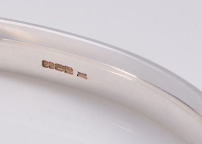 Lot 61 - A modern silver torque bangle