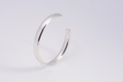 Lot 61 - A modern silver torque bangle