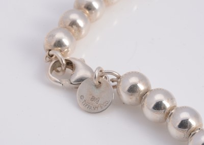 Lot 67 - A silver Tiffany & Co graduated ball necklace, in turquoise box marked Tiffany & Co