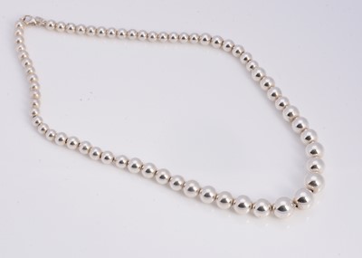 Lot 67 - A silver Tiffany & Co graduated ball necklace, in turquoise box marked Tiffany & Co