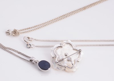 Lot 71 - A synthetic star sapphire silver pendant necklace, mother of pearl flower brooch with pendant bail