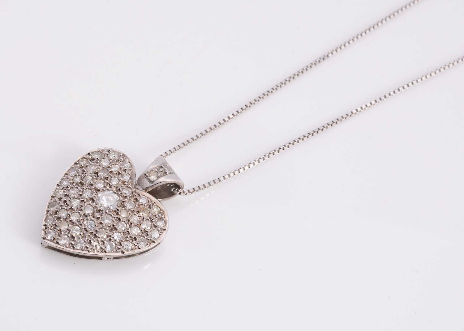 Lot 72 - A 18ct white gold pave set heart pendant necklace