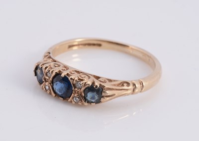 Lot 83 - A 9ct gold sapphire & diamond dress ring