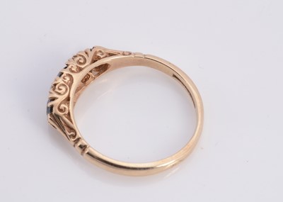 Lot 83 - A 9ct gold sapphire & diamond dress ring
