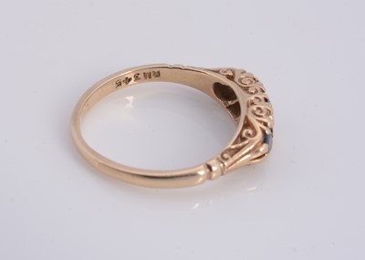 Lot 83 - A 9ct gold sapphire & diamond dress ring