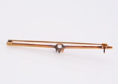 Lot 91 - A yellow metal diamond set bar brooch