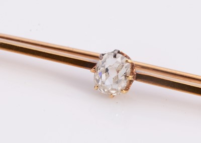 Lot 91 - A yellow metal diamond set bar brooch