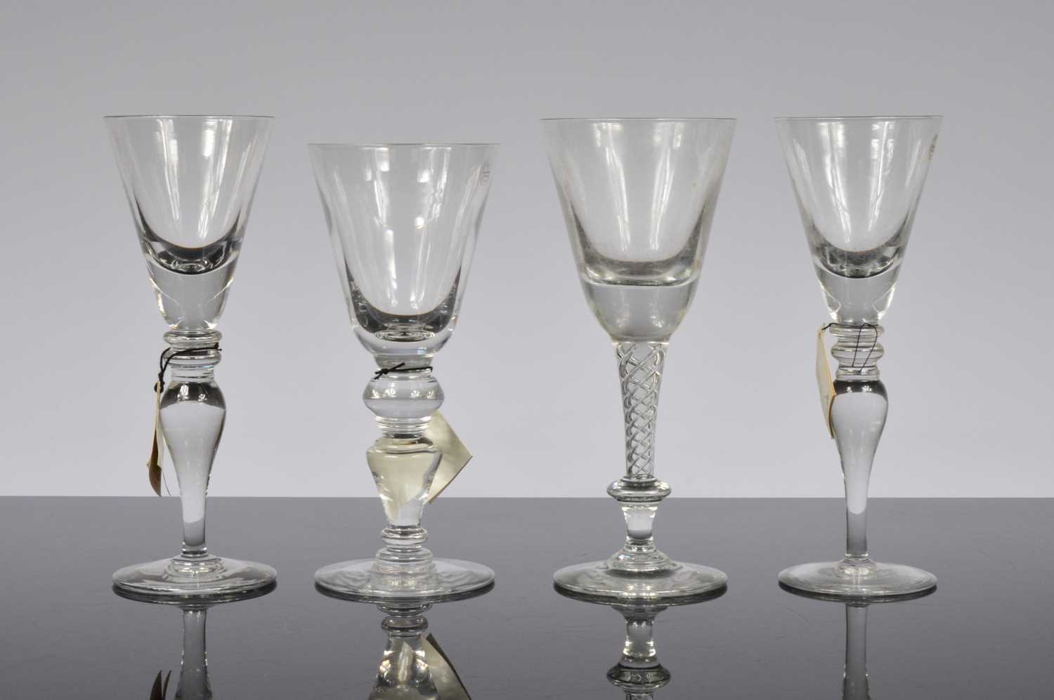Lot 7 - Four second half 20th century Cumbria Crystal large glass goblets
