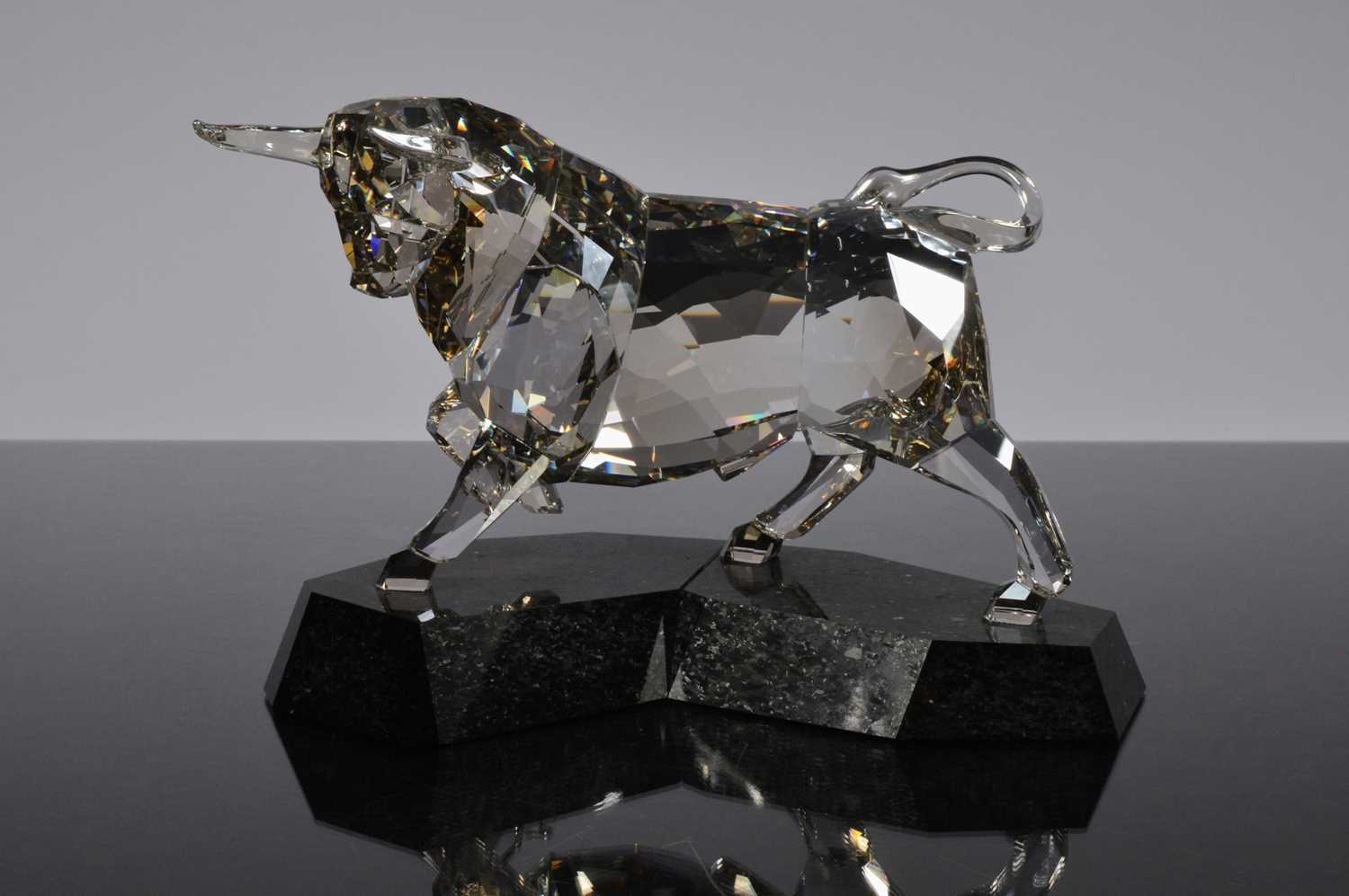 Lot 28 - A Swarovski Crystal figure of a Bull