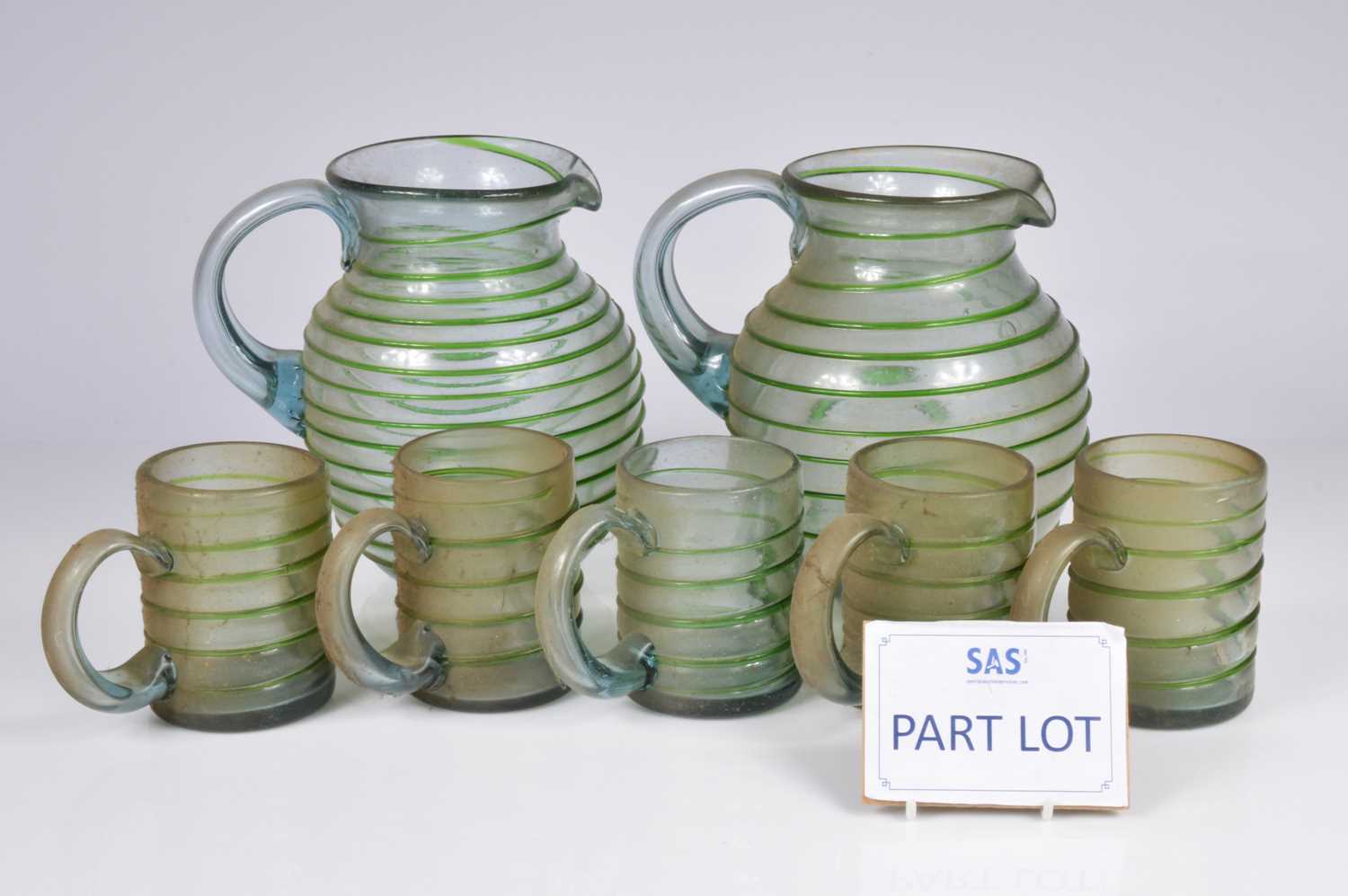 Lot 35 - A set of early 20th century continental glass tankards and pair of jugs