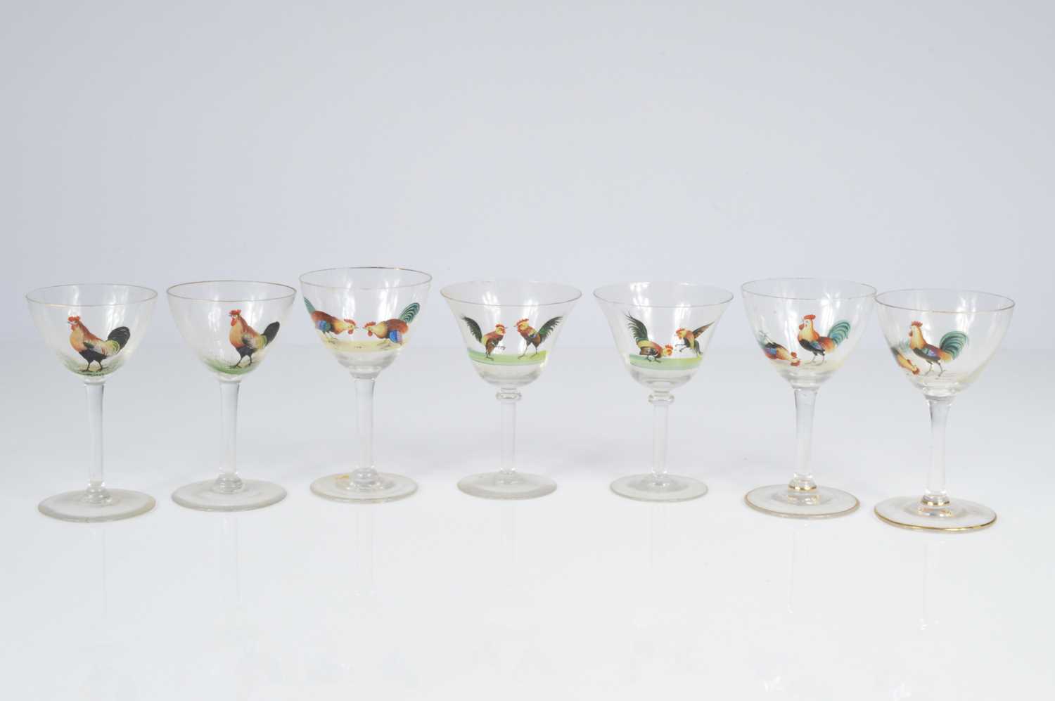 Lot 38 - Seven early 20th century cock fighting drinking glasses