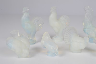Lot 45 - Eight Art Deco Sabino glass bird figures and a similar bird