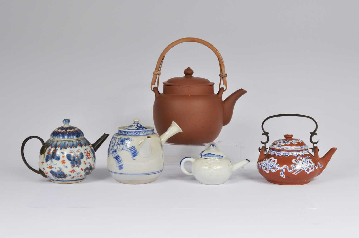 Lot 58 - Five Chinese teapots