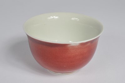 Lot 60 - A pair of Chinese Sang Du Beouf porcelain tea bowls