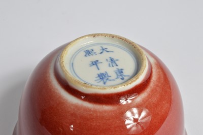 Lot 60 - A pair of Chinese Sang Du Beouf porcelain tea bowls